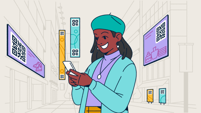 A woman standing in a city with digital advertisements featuring QR Codes around her. She's holding a smartphone in her hands.