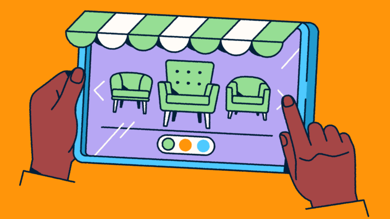 Hands holding a tablet that looks like a retail front with an awning. Furniture is displayed on the screen.